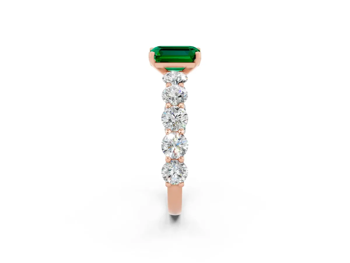 Emerald Cut Emerald Prong Setting with Side Stones on a Pave Band Rose gold