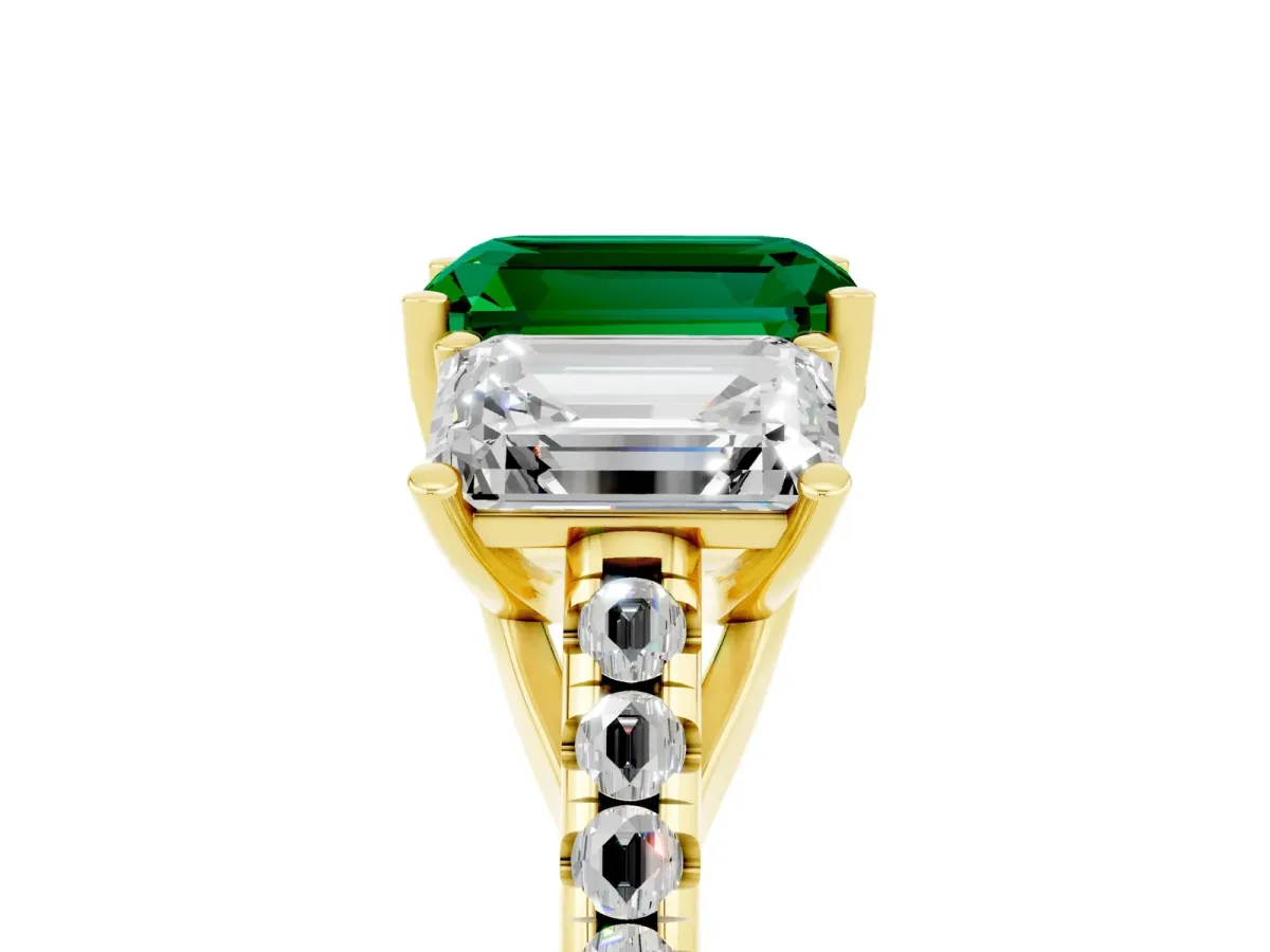Three-Stone Emerald Cut Emerald Ring with Round Pavé Band and Prong Setting Yellow gold