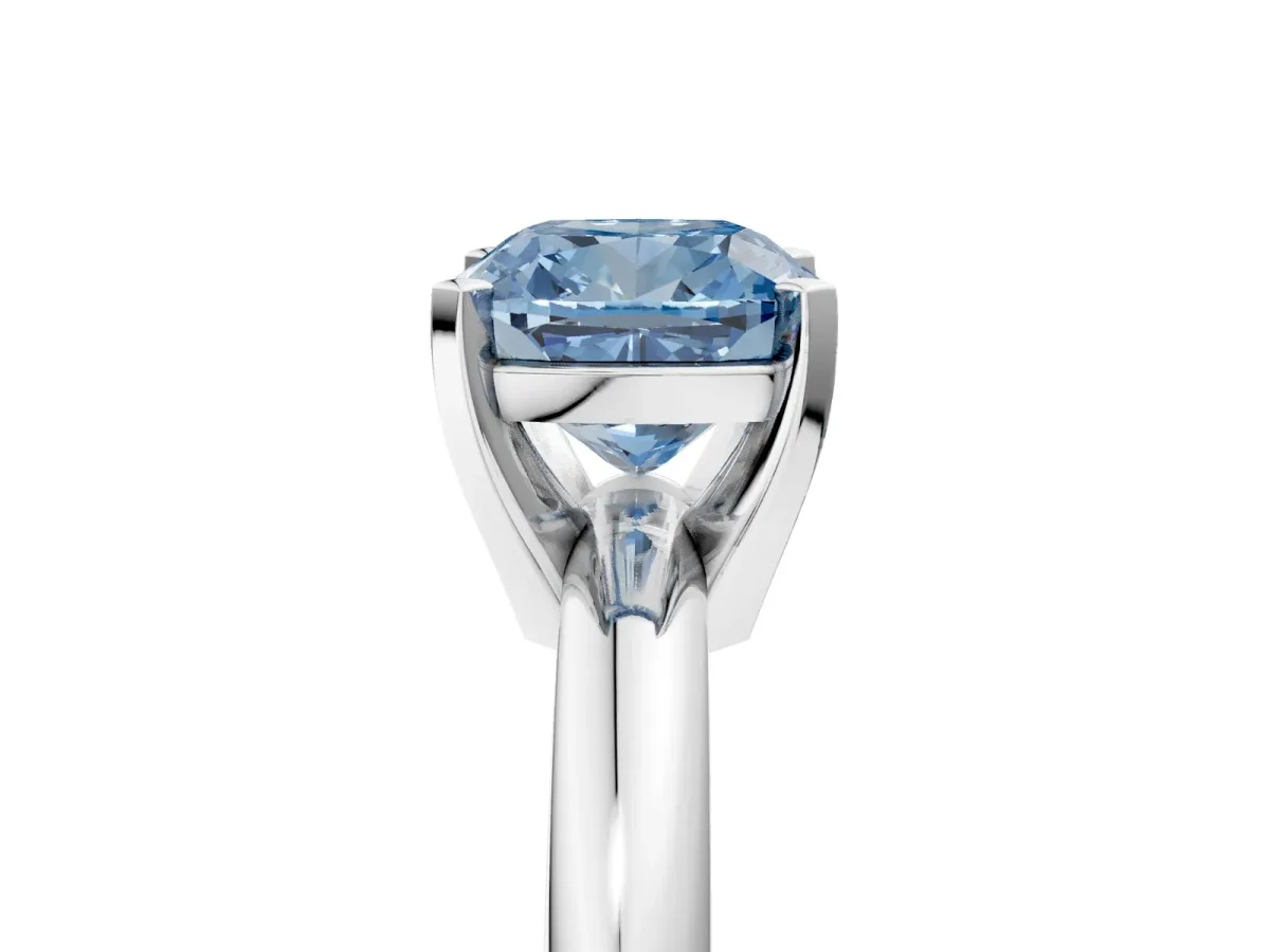 Fancy Blue Cushion Cut Diamond Solitaire Engagement Ring with Round Band and Four-Prong Setting Silver