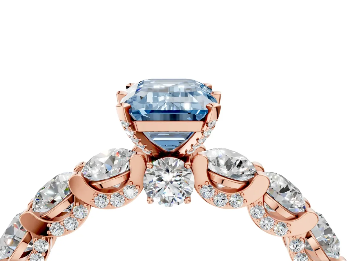 Fancy Blue Emerald Cut Diamond Side Stone Engagement Ring with Four-Prong Setting Rose gold