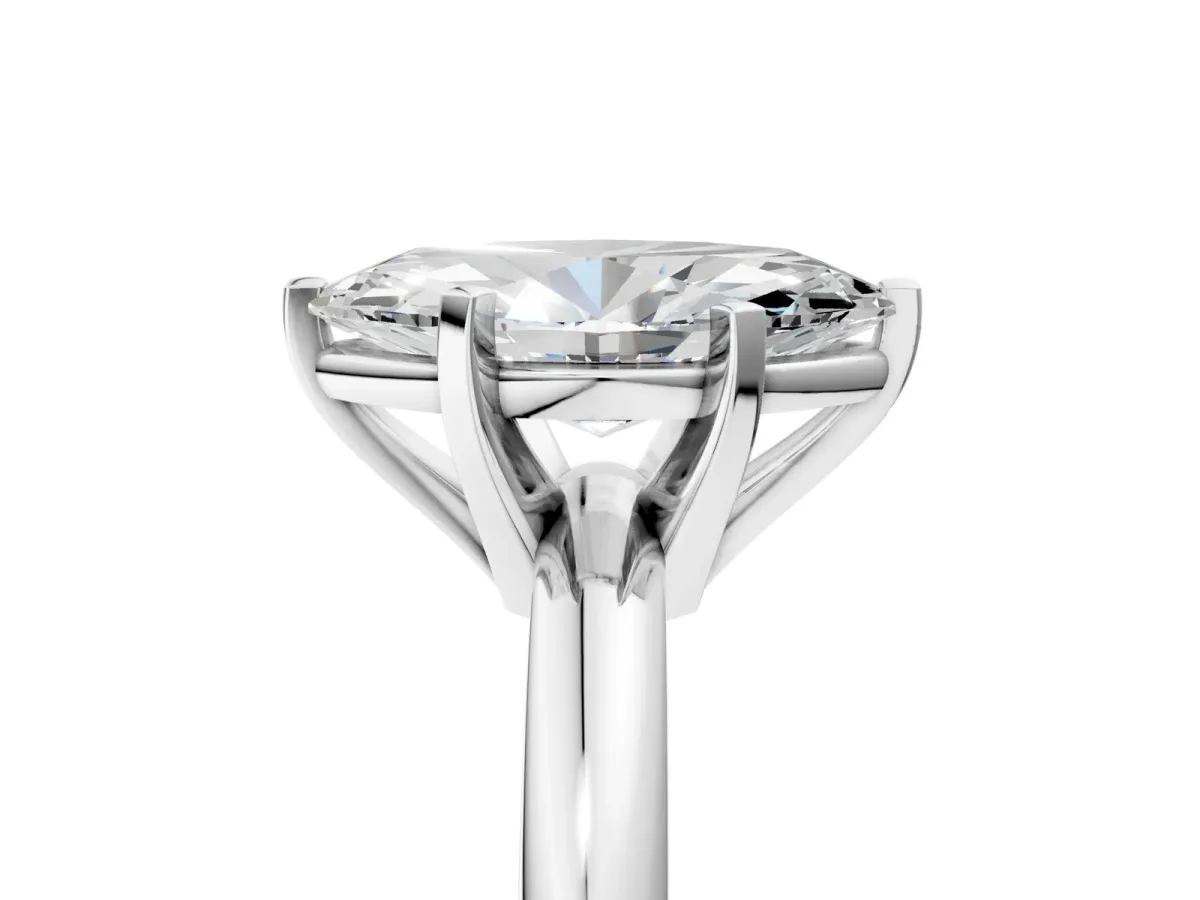 Marquise Cut Diamond Solitaire Engagement Ring with Round Band and Four-Prong Setting Silver