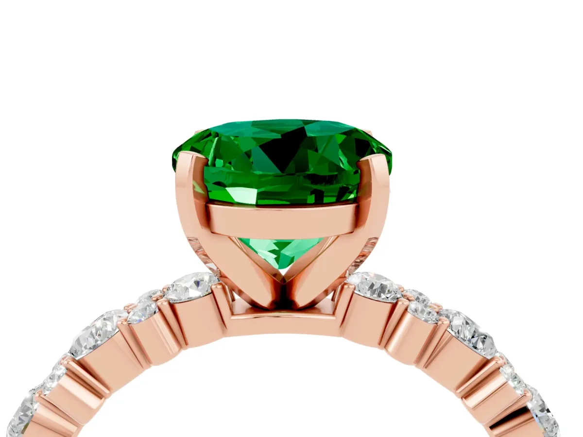 Round Cut Emerald Side Stone Solitaire Ring with Round and Four-Prong Setting Rose gold