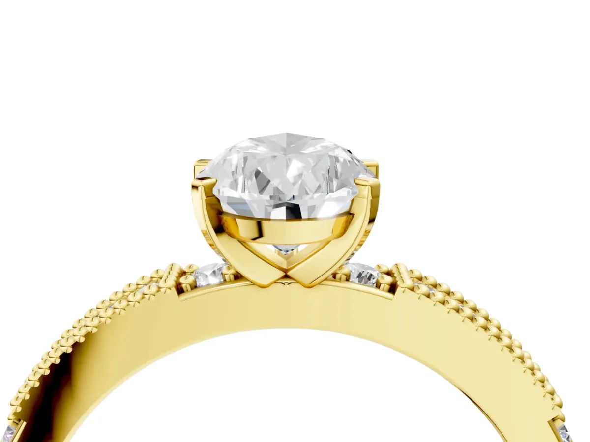 Pear Cut Solitaire with Pavé Band and Four-Prong Setting Yellow gold