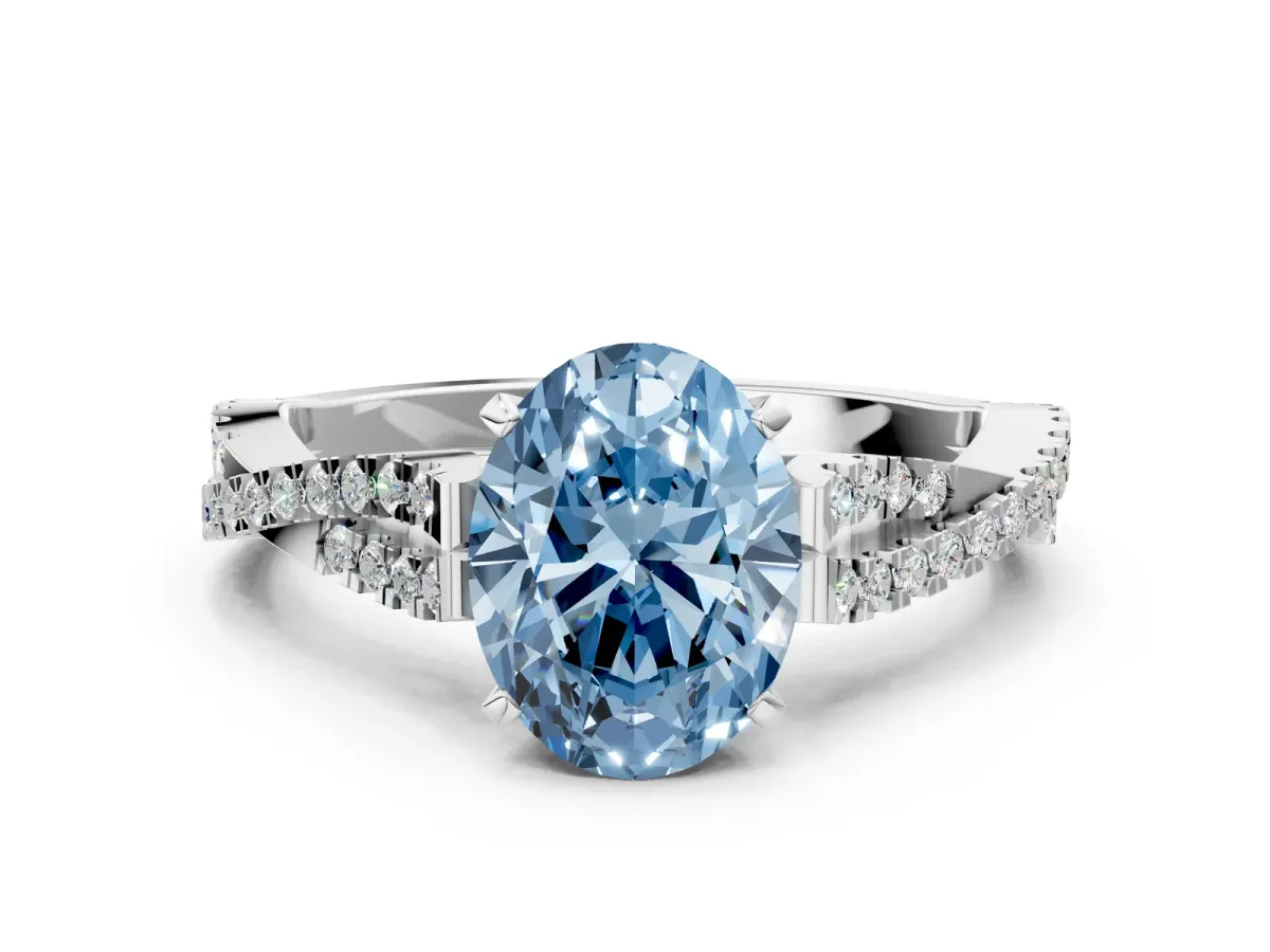 Fancy Blue Oval Cut Diamond Solitaire Engagement Ring with Twisted Pavé Band and Four-Prong Setting Silver