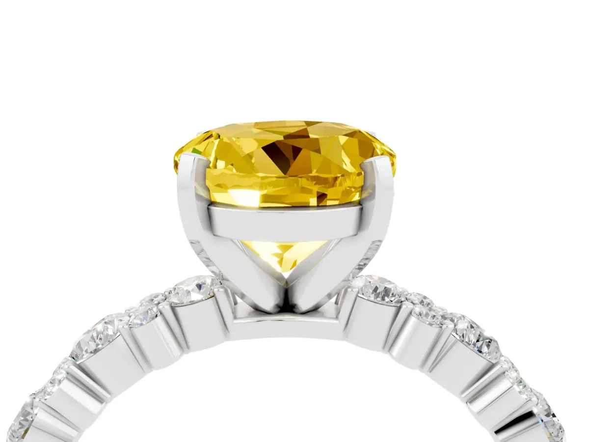 Round Cut Yellow Sapphire Side Stone Solitaire Ring with Round and Four-Prong Setting White gold