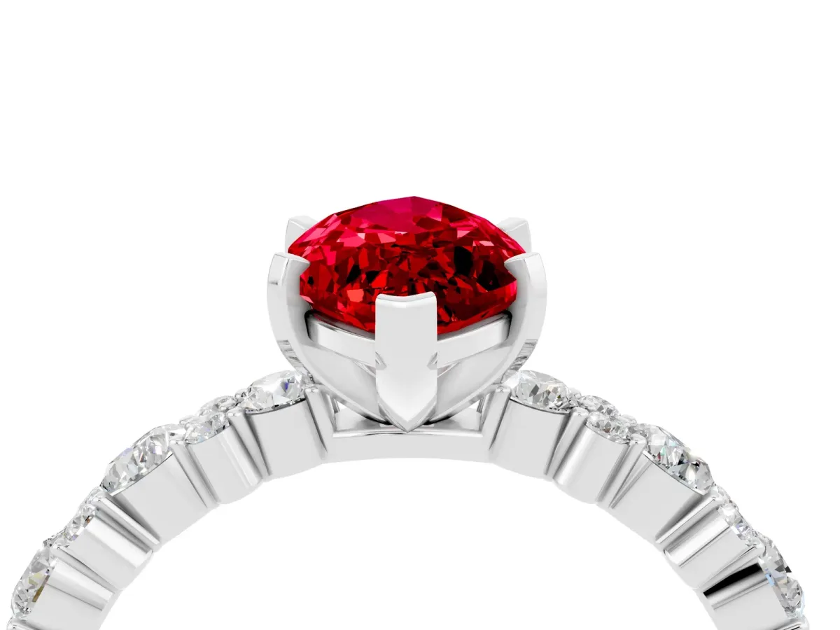 Marquise Cut Ruby Side Stone Solitaire Ring with Round and Four-Prong Setting Platinum