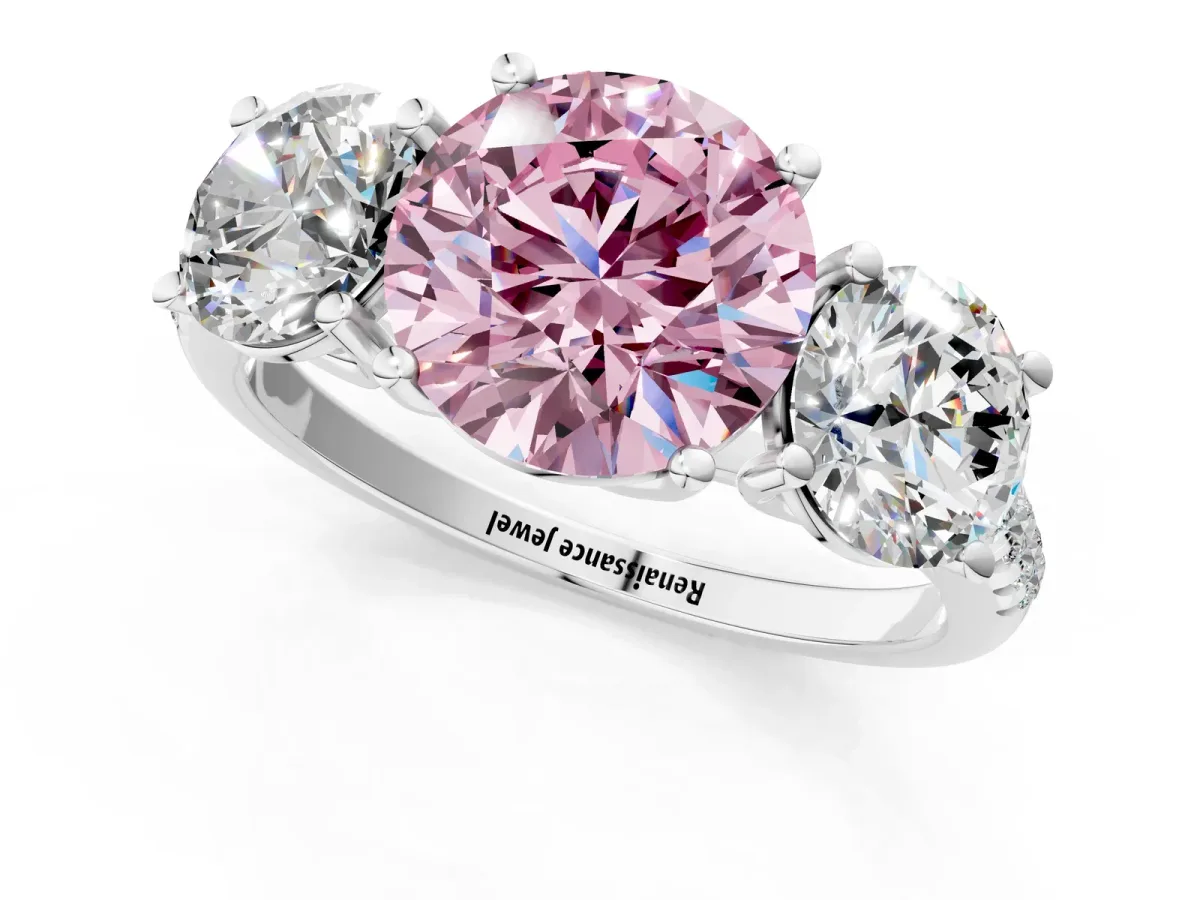 Fancy Pink Three-Stone Round Cut Diamond Ring with Round Pavé Band and Prong Setting Silver