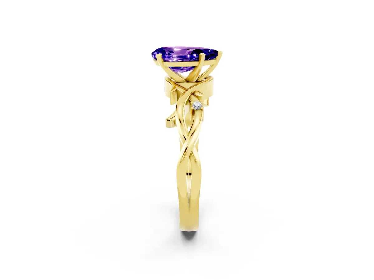 Pear Cut Tanzanite Solitaire Ring with Twisted Band and Prong Setting Yellow gold
