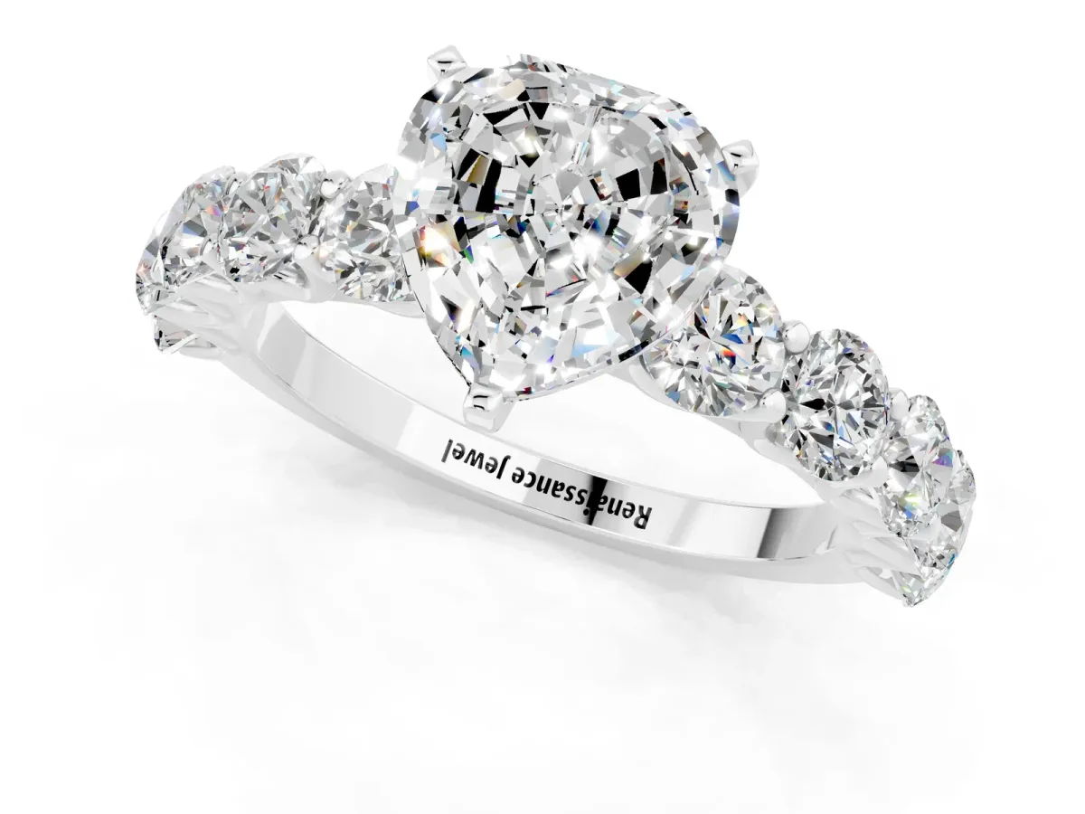 Heart Cut Moissanite Prong Setting with Side Stones on a Pave Band Silver