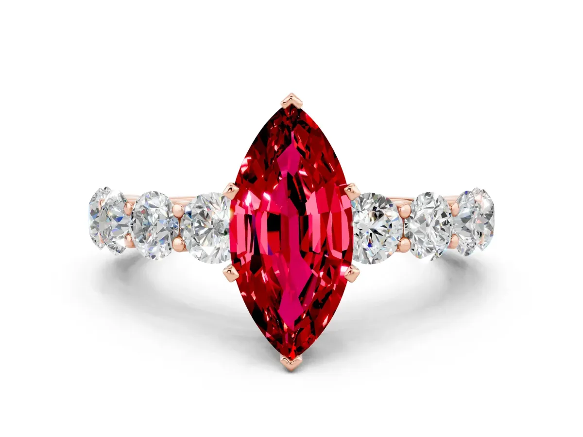 Marquise Cut Ruby Prong Setting with Side Stones on a Pave Band Rose gold