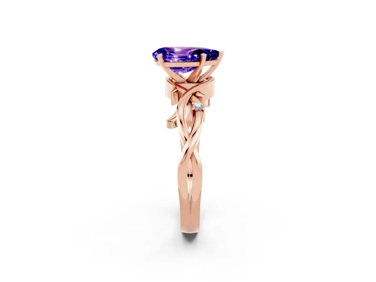 Pear Cut Tanzanite Solitaire Ring with Twisted Band and Prong Setting Rose gold