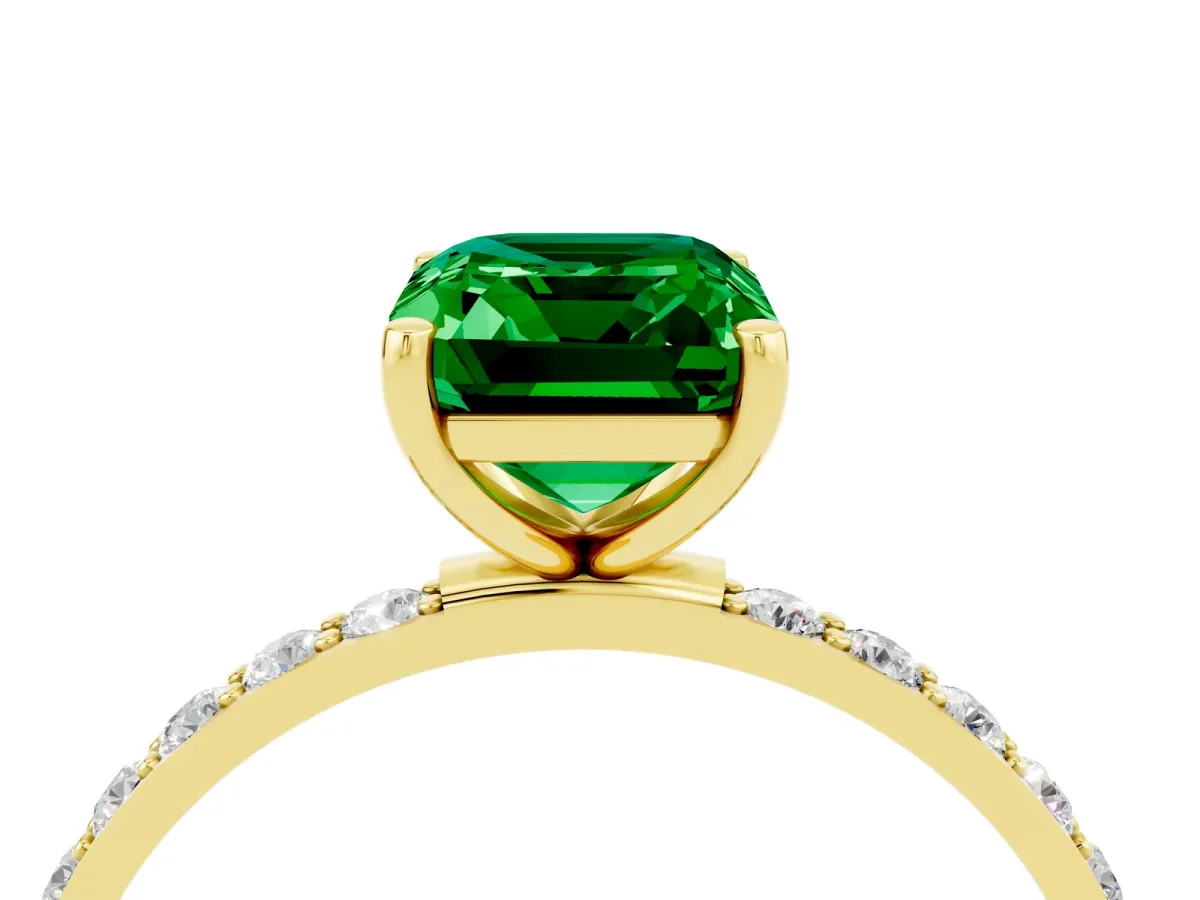 Emerald Cut Emerald Solitaire Ring with Round Pavé Band and Prong Setting Yellow gold