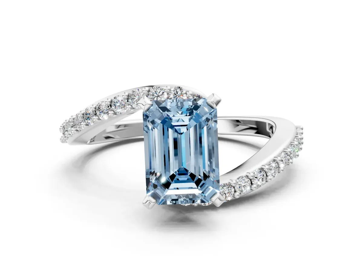 Fancy Blue Emerald Cut Solitaire Twist Band with Pave Set Diamonds and Four-Prong Setting Platinum