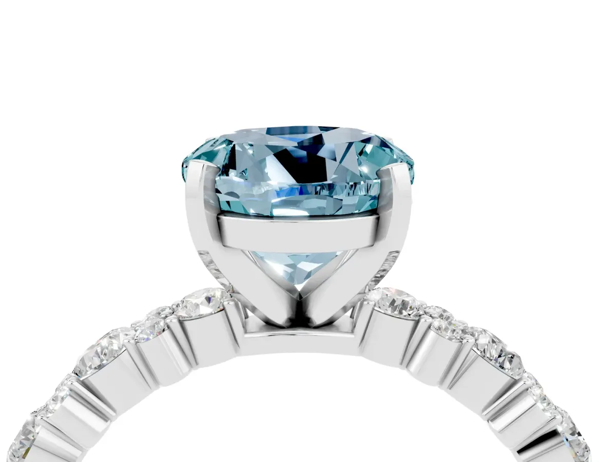Round Cut Aquamarine Side Stone Solitaire Ring with Round and Four-Prong Setting Platinum
