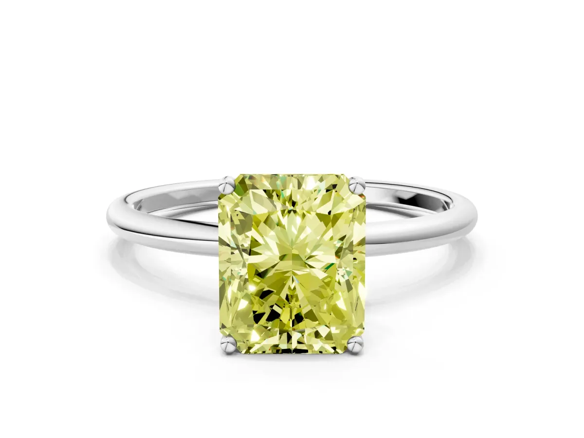 Fancy Yellow Radiant Cut Cut Solitaire Engagement Ring with Thin Band and Four-Prong Setting Platinum