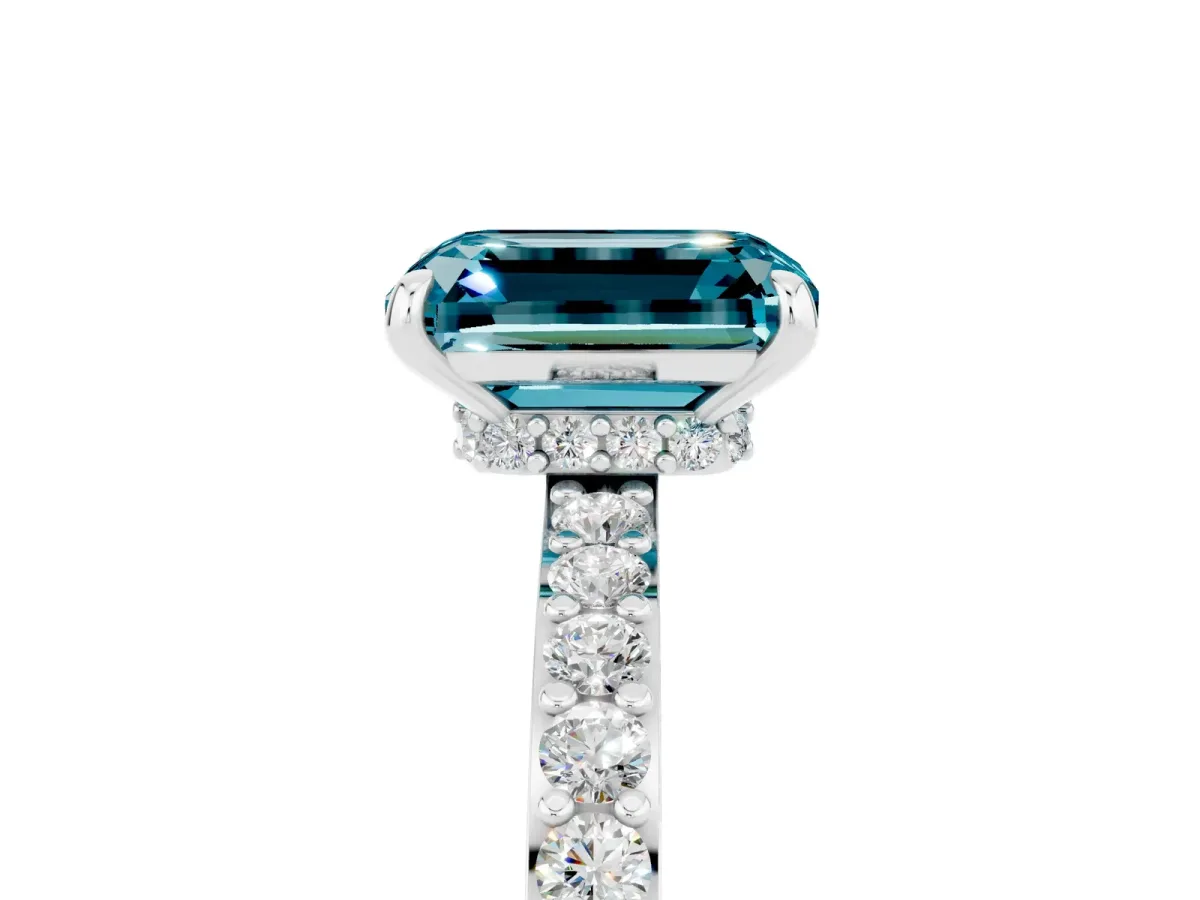 Emerald Cut Blue Topaz Solitaire Engagement Ring with Pavé Band and Four-Prong Setting Silver