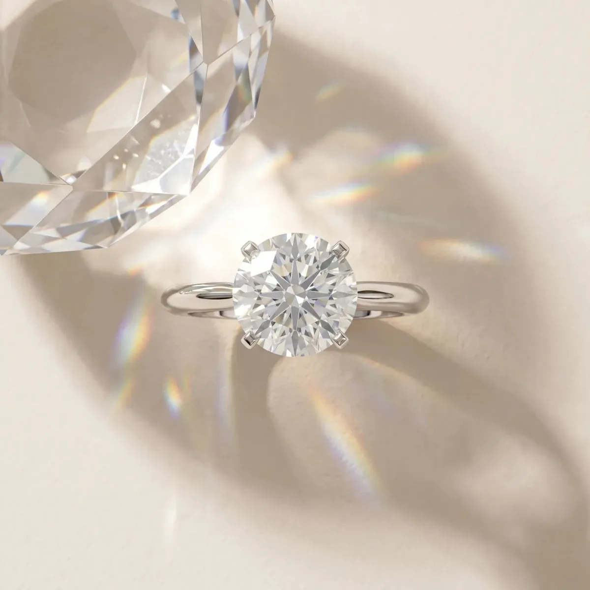 Round Cut Diamond Solitaire Engagement Ring with Classic Band and Four-Prong Setting Silver