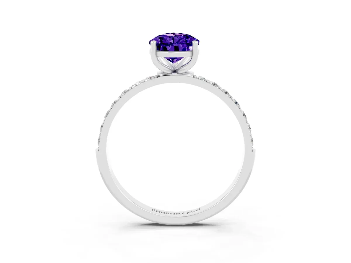 Pear Cut Tanzanite Solitaire Ring with Round Pavé Band and Prong Setting Silver