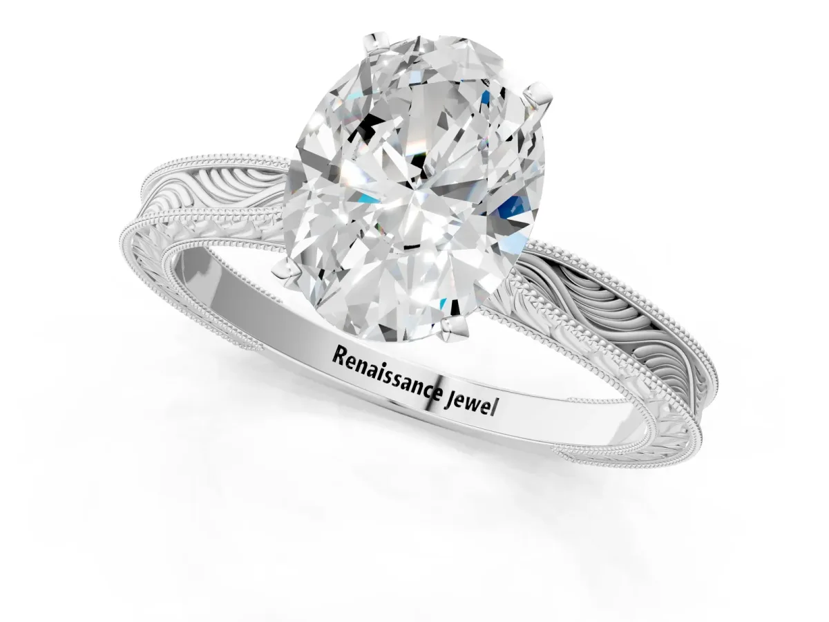 Oval Cut Solitaire Milgrain Engraved Band with Four-Prong Setting White gold