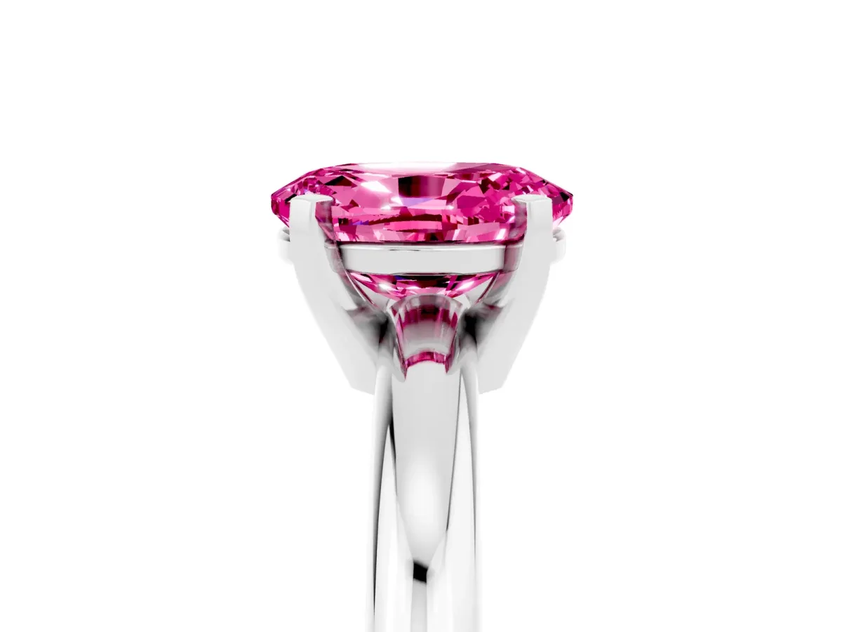 Oval Cut Pink Sapphire Solitaire Engagement Ring with Round Band and Four-Prong Setting Silver