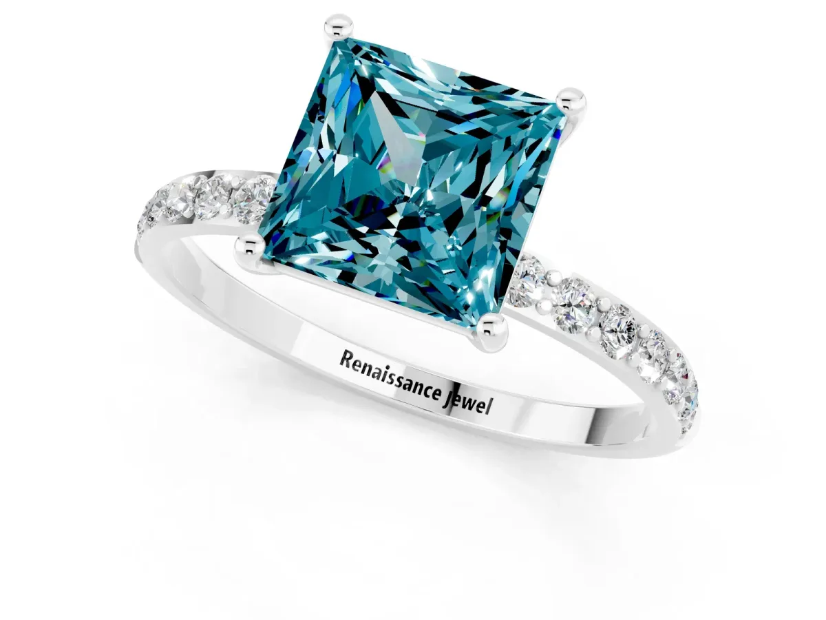 Princess Cut Blue Topaz Solitaire Ring with Round Pavé Band and Prong Setting Silver