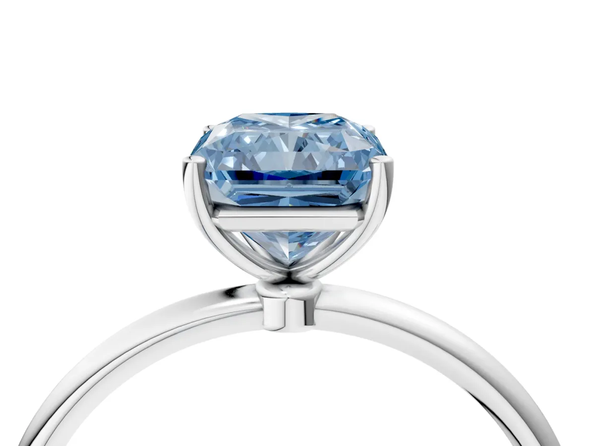 Fancy Blue Radiant Cut Cut Solitaire Engagement Ring with Thin Band and Four-Prong Setting Platinum