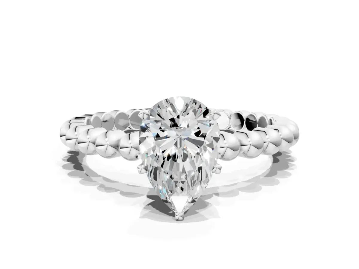 Pear Cut Diamond Solitaire Ring with Beaded Band and Prong Setting Platinum