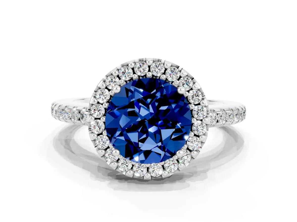 Round Cut Blue Sapphire Pavé Halo Ring with Four-Prong Setting Platinum