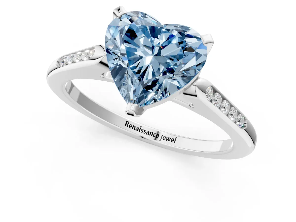 Fancy Blue Heart Cut Diamond Solitaire Ring with Channel Set Round Band and Prong Setting Silver