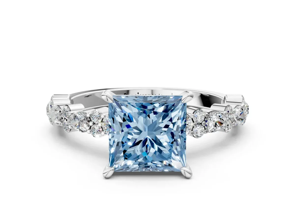 Fancy Blue Princess Cut Diamond Side Stone Solitaire Ring with Round and Four-Prong Setting Platinum