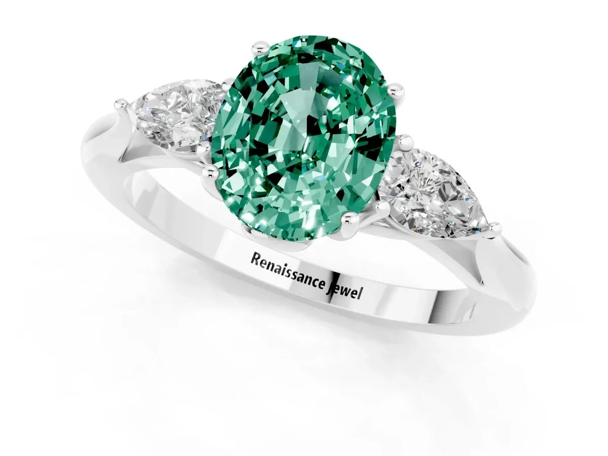 Three-Stone Oval Cut Green Sapphire Ring with Pear Side Stones in Four-Prong Setting White gold