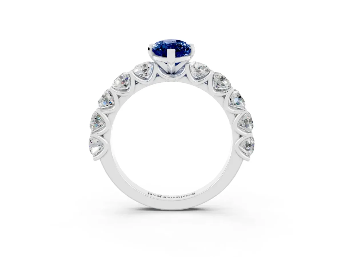 Marquise Cut Blue Sapphire Prong Setting with Side Stones on a Pave Band Silver