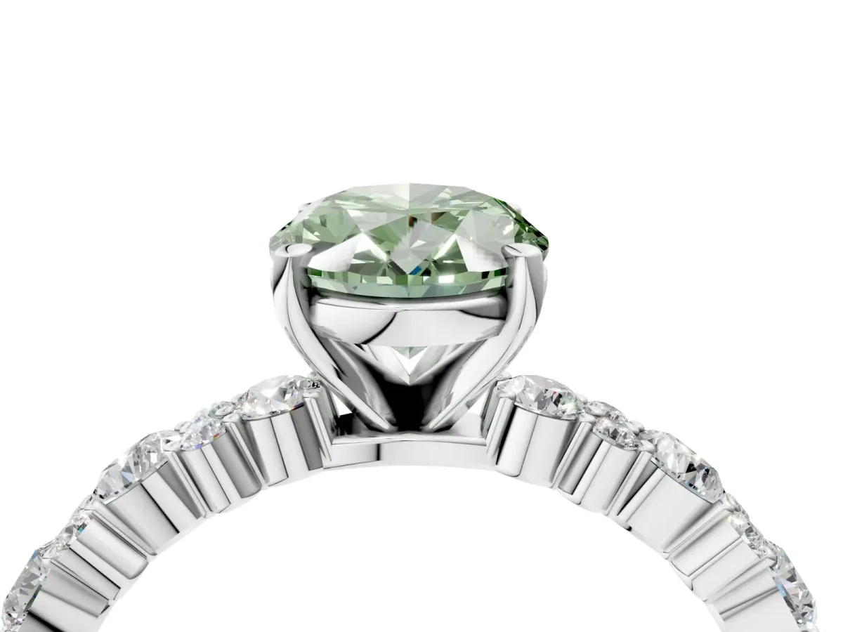 Fancy Green Oval Cut Diamond Side Stone Solitaire Ring with Round and Four-Prong Setting Platinum