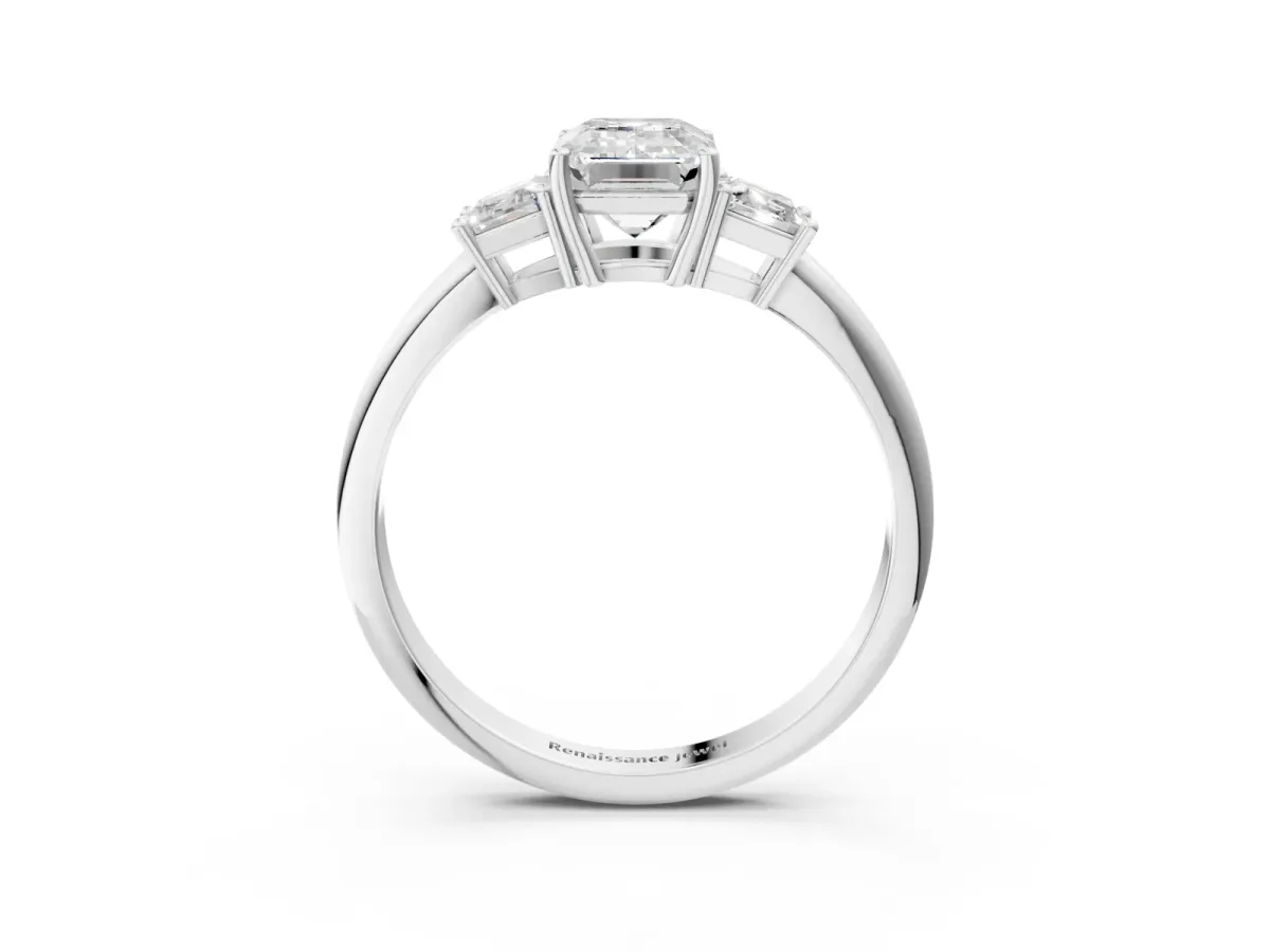 Emerald Cut Diamond Three-Stone Ring with Trapezoid Side Stones and Prong Setting Silver