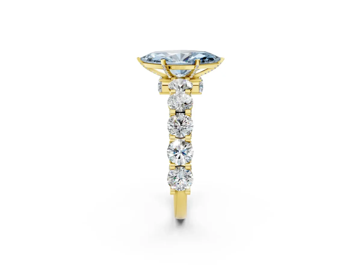 Fancy Blue Marquise Cut Diamond Side Stone Engagement Ring with Four-Prong Setting Yellow gold