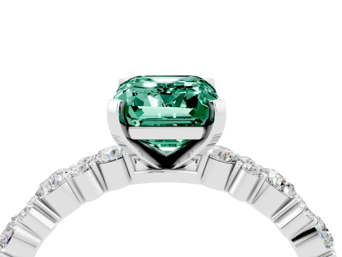 Emerald Cut Green Sapphire Side Stone Solitaire Ring with Round and Four-Prong Setting White gold