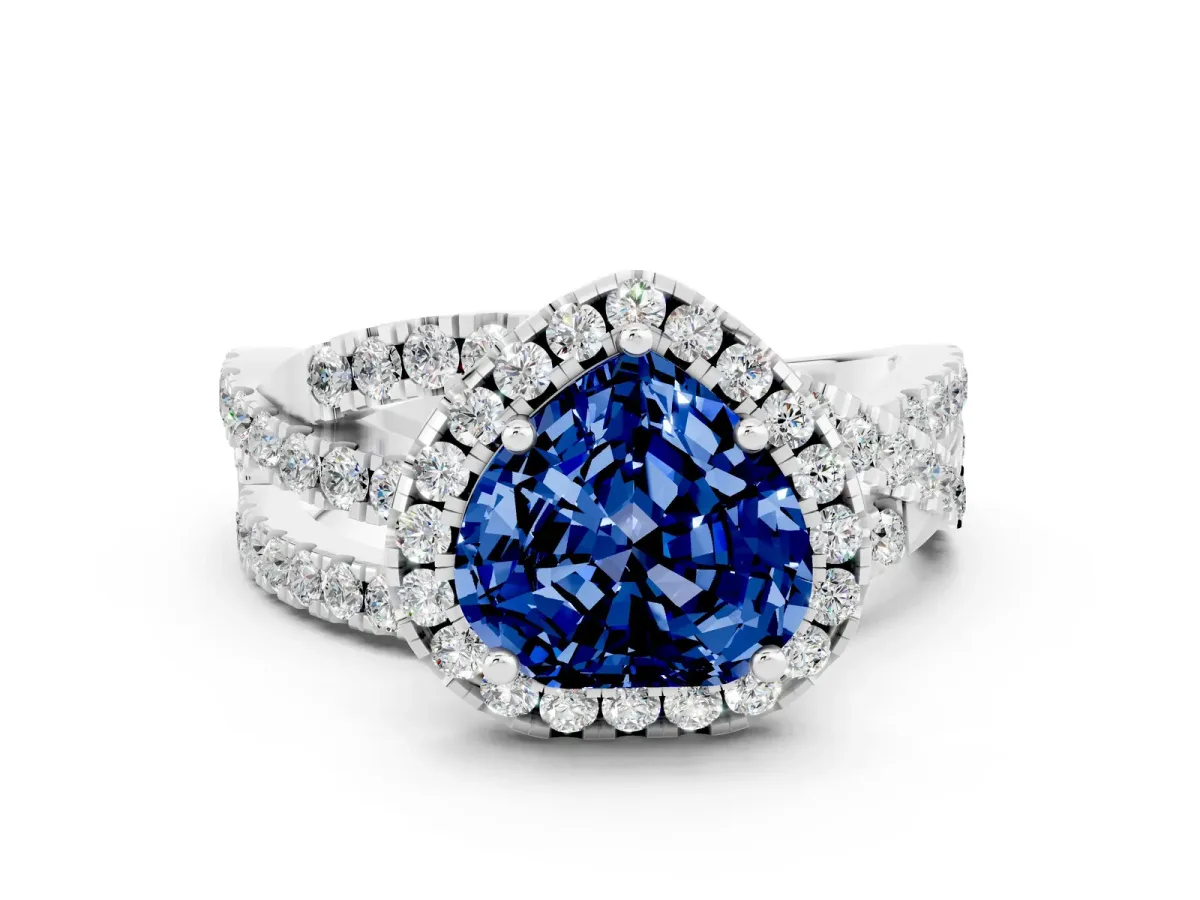 Heart Cut Blue Sapphire Halo Ring with Round Split Shank and Prong Setting Platinum