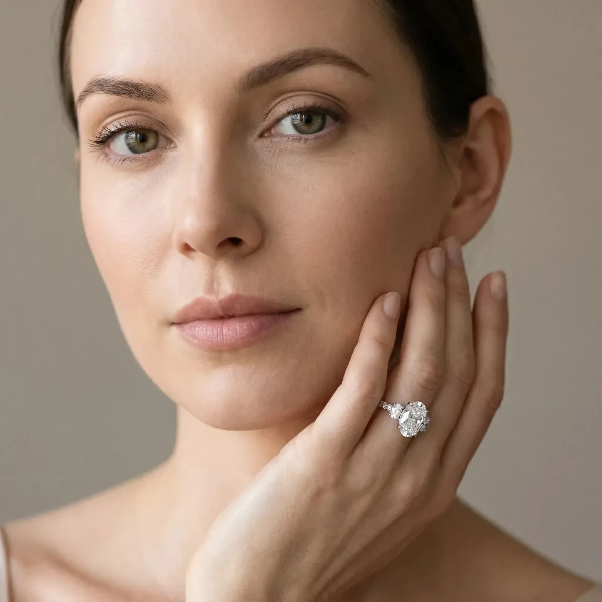 Oval Cut Brilliant Trilogy Channel Set Diamond Ring with Bar Prongs Platinum