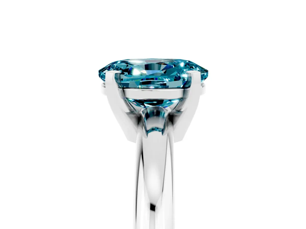 Oval Cut Blue Topaz Solitaire Engagement Ring with Round Band and Four-Prong Setting Silver