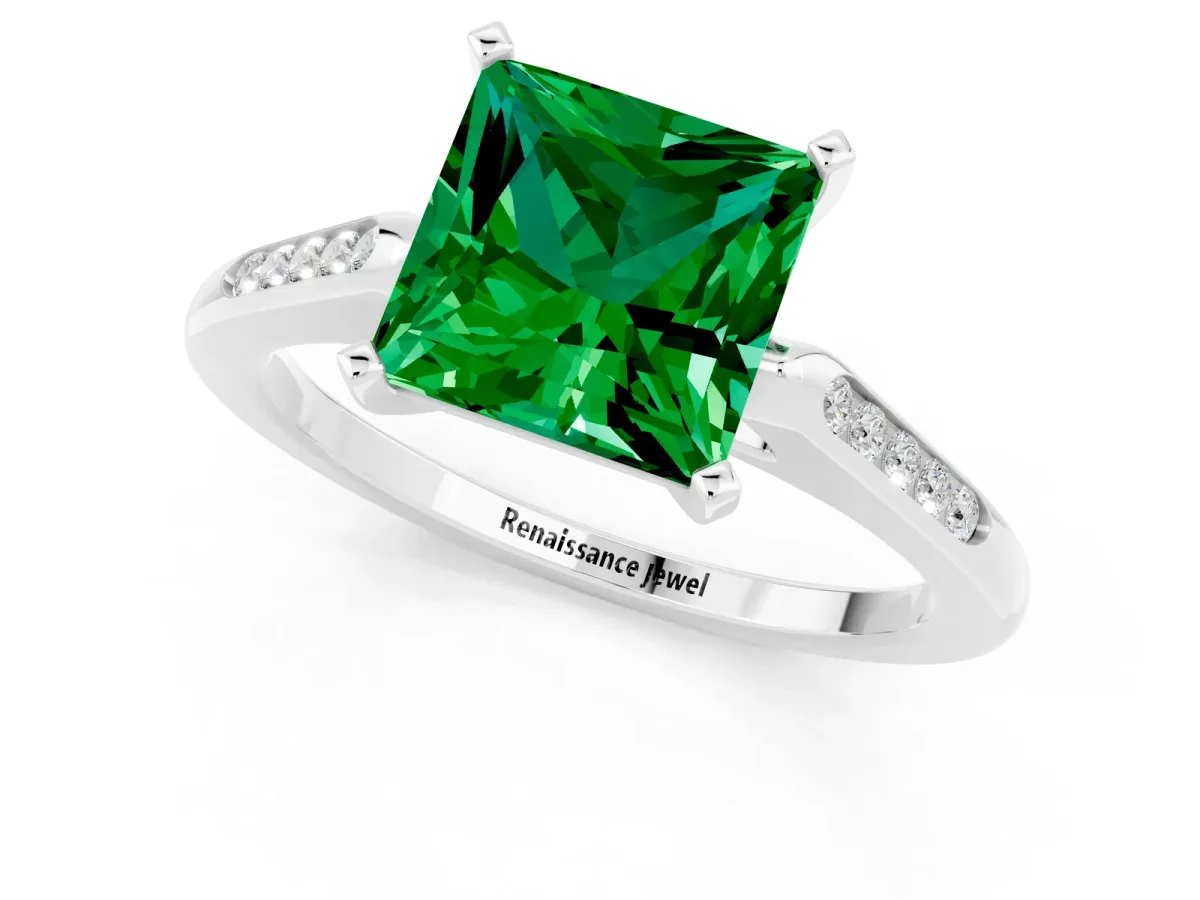 Princess Cut Emerald Solitaire Ring with Channel Set Round Band and Prong Setting Silver