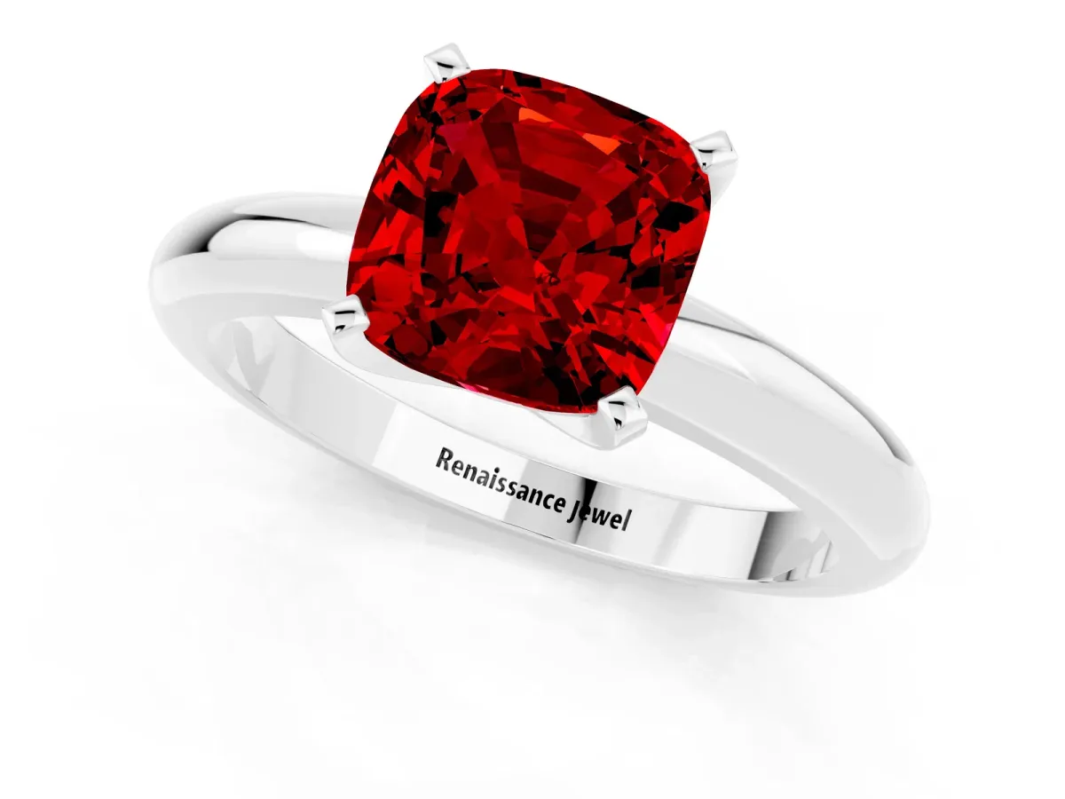 Cushion Cut Ruby Solitaire Engagement Ring with Round Band and Four-Prong Setting Platinum