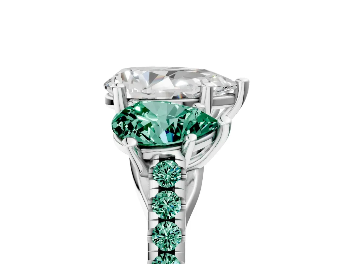 Three-Stone Pear Cut Diamond Ring with Round Green Sapphire Pavé Band and Prong Setting Silver