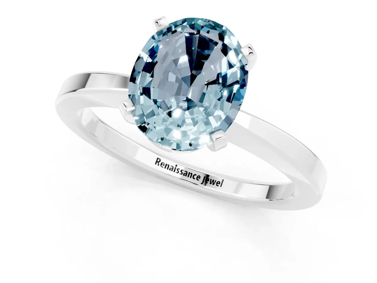 Oval Cut Aquamarine Solitaire Engagement Ring with Classic Band and Four-Prong Setting Silver