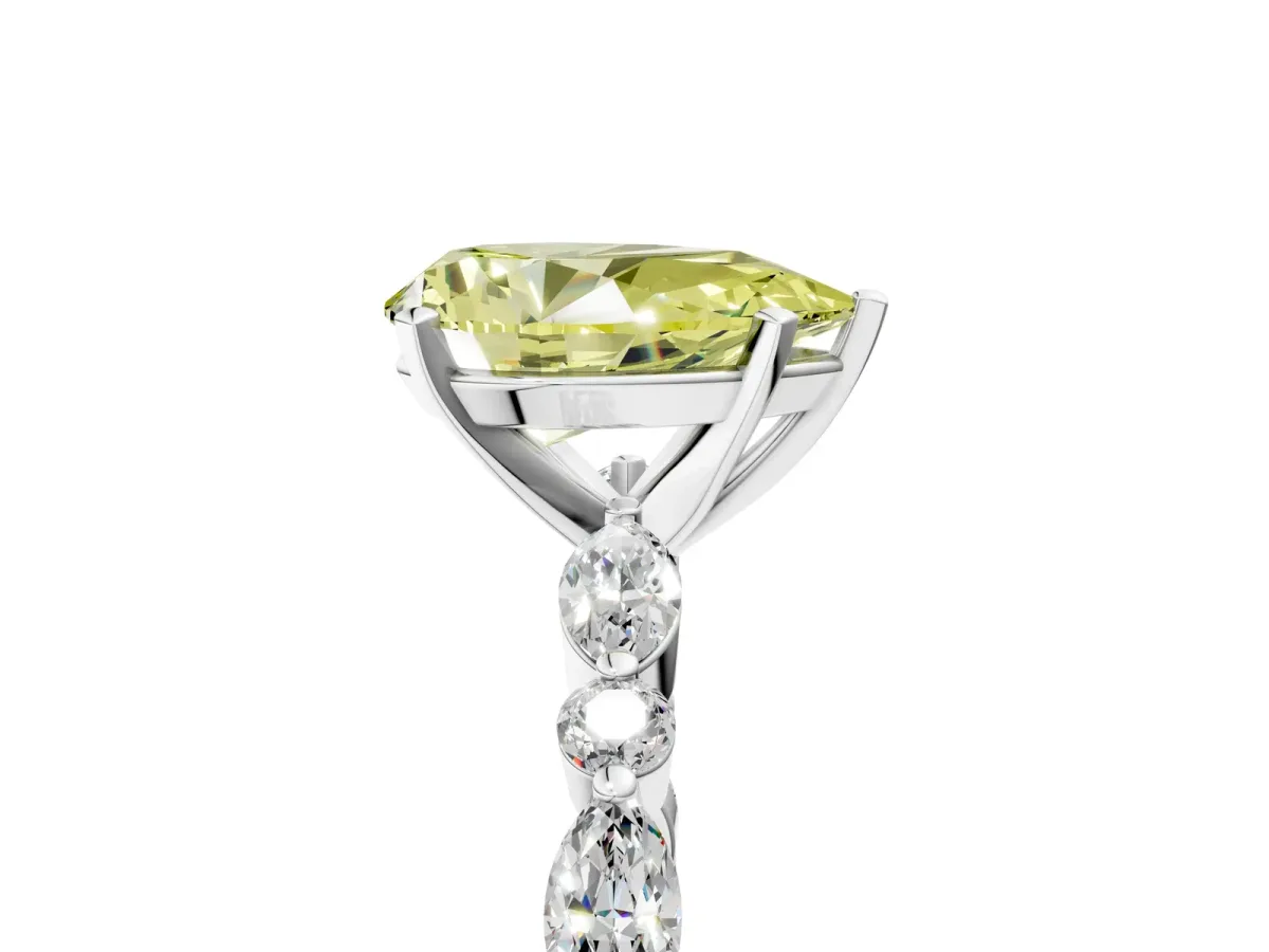 Fancy Yellow Pear Cut Diamond Ring with Marquise and Round Side Stones and Four-Prong Setting Silver