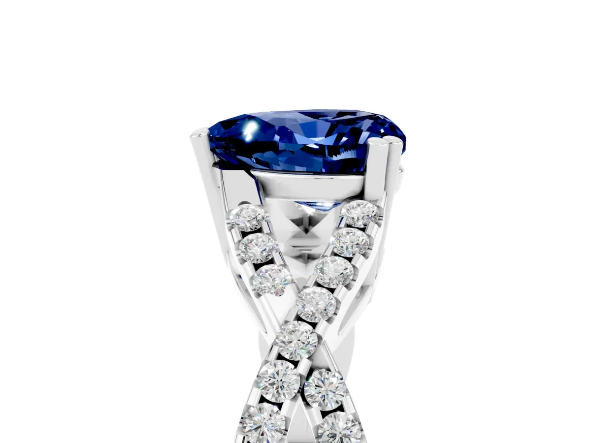 Heart Cut Blue Sapphire Solitaire Ring with Four-Prong Setting and Twisted Pavé Band Silver