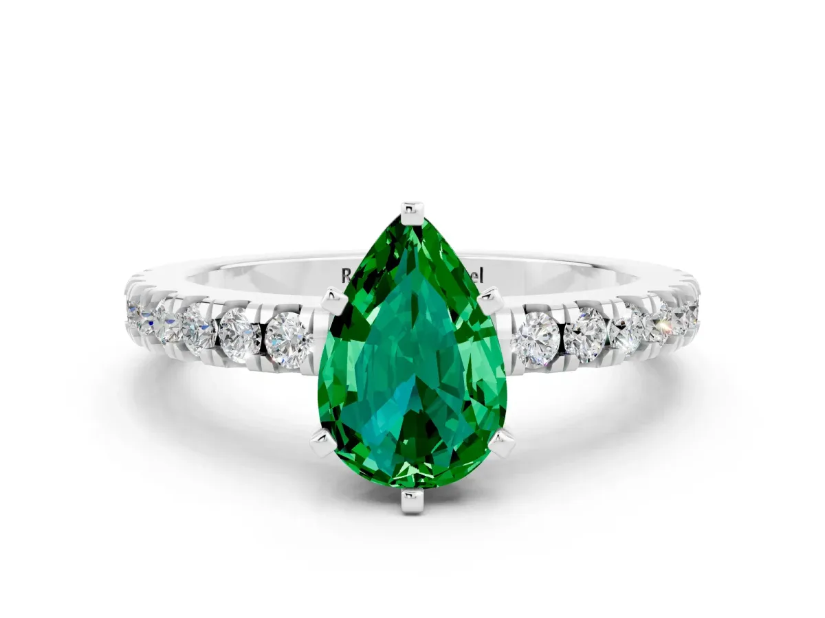 Pear Cut Solitaire Emerald with Pavé Band and Four-Prong Setting White gold