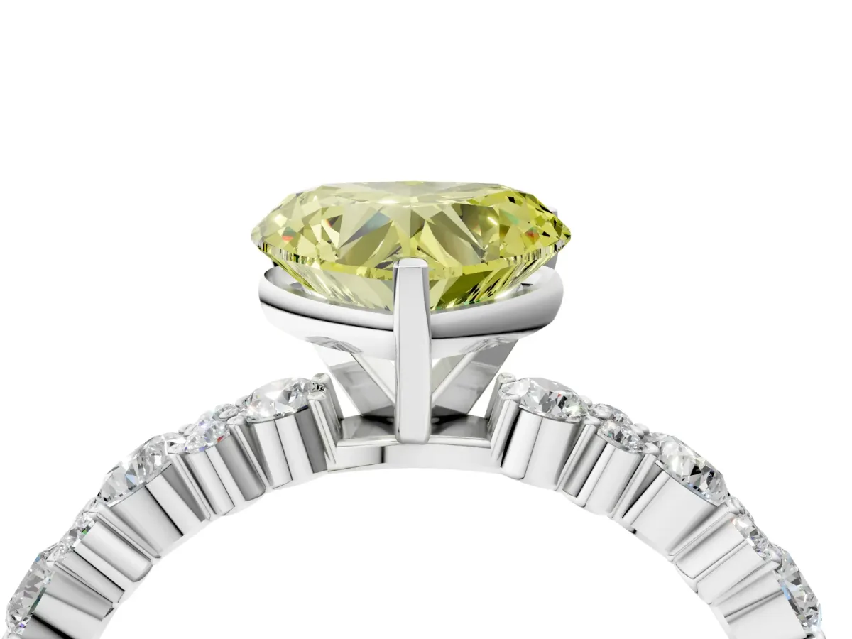 Fancy Yellow Heart Cut Diamond Side Stone Solitaire Ring with Round and Four-Prong Setting Platinum