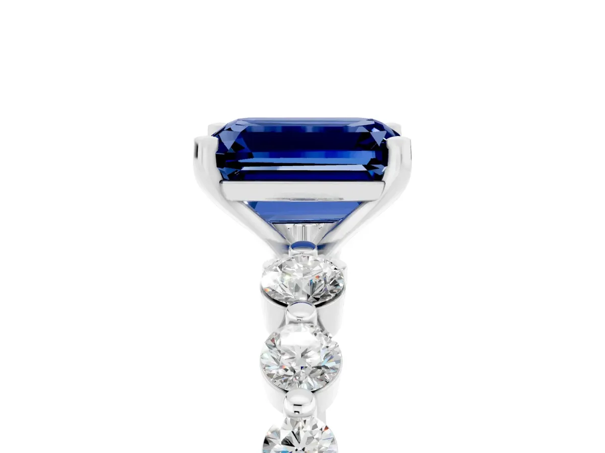 Emerald Cut Solitaire Blue Sapphire Ring with Pave Band and Four-Prong Setting Silver