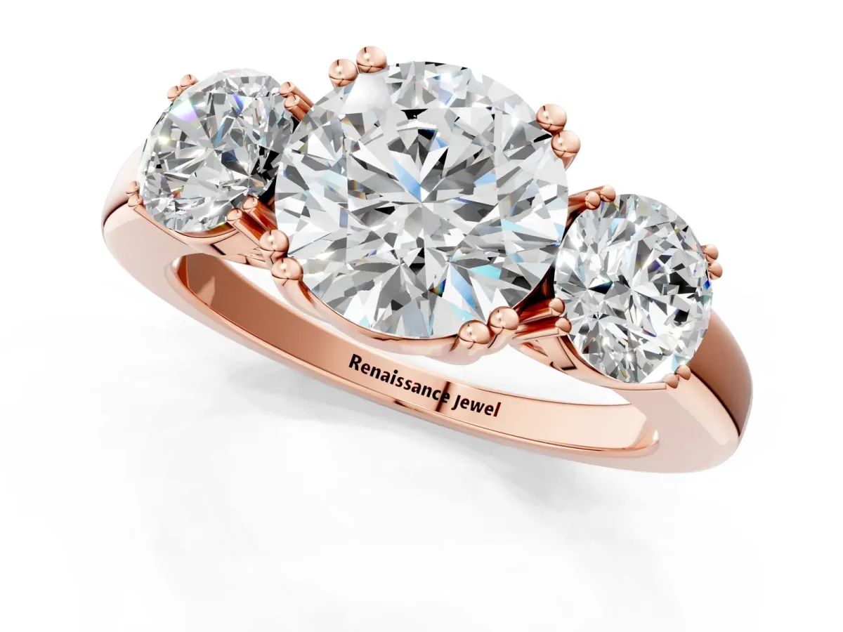 Three-Stone Round Cut Cut Diamond Ring with Channel Set Band and Four-Prong Setting Rose gold