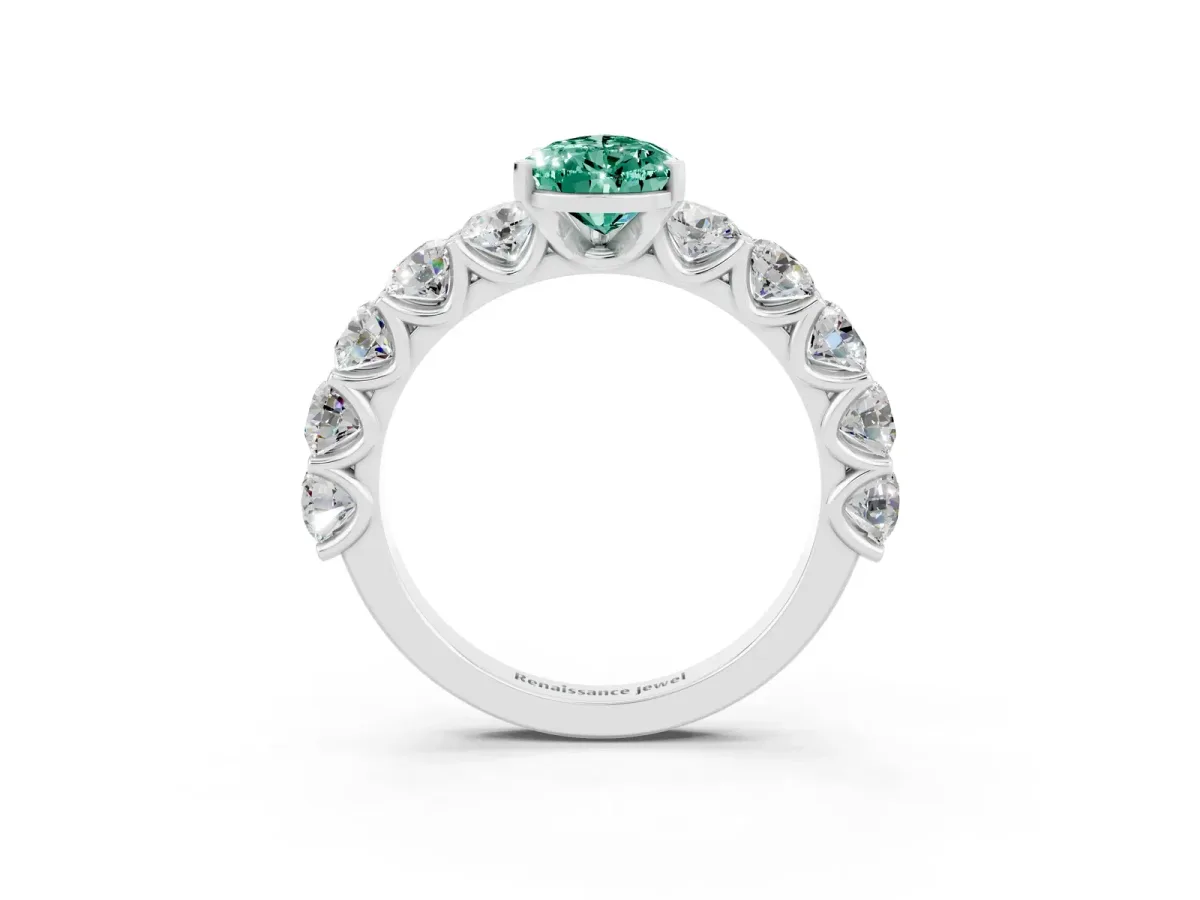 Pear Cut Green Sapphire Prong Setting with Side Stones on a Pave Band Silver